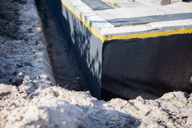 Professional Emergency Waterproofing technician working in Geneseo, KS